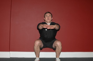 Kyle Farningham demonstrating a squat at Factory Gyms